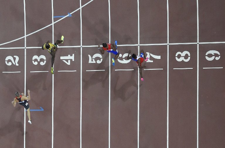 Reus de Alemania, Bolt de Jamaica, Palacios de Honduras en Beijing. Foto AFP