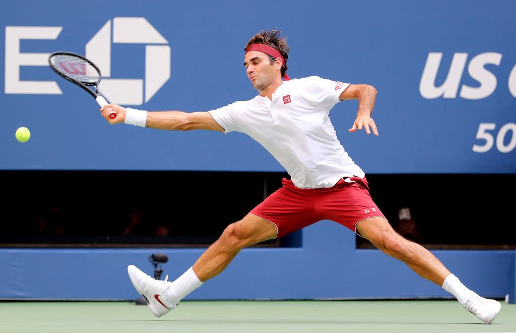 Federer y Djokovic, en otra calurosa jornada, triunfan en el US Open