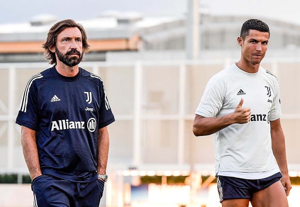 Andrea Pirlo junto a Cristiano Ronaldo durante la práctica. Foto Juventus